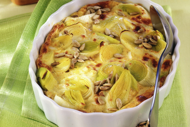 Gratin di porro con semi di girasole e Emmentaler DOP